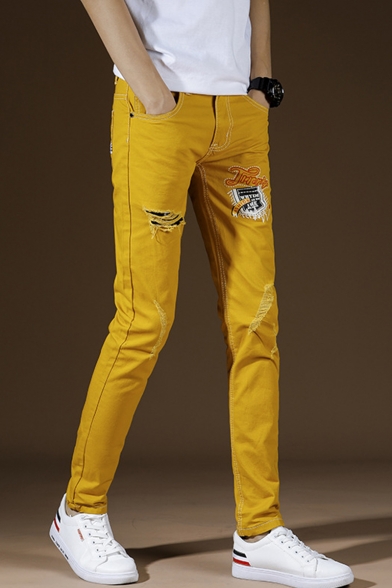yellow ripped jeans mens