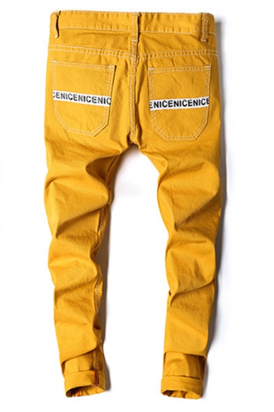 yellow ripped jeans mens