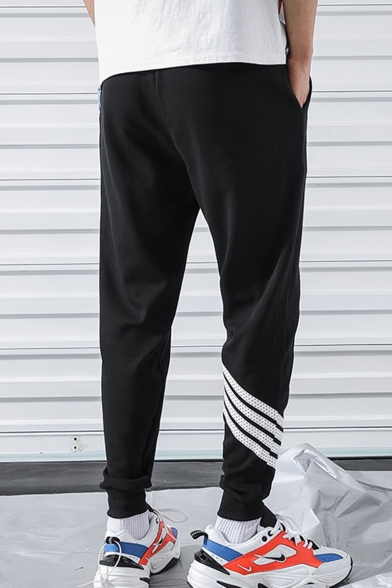 Guys Trendy Contrast Stripe Printed Drawstring Waist Black Cotton Relaxed Tapered Pants
