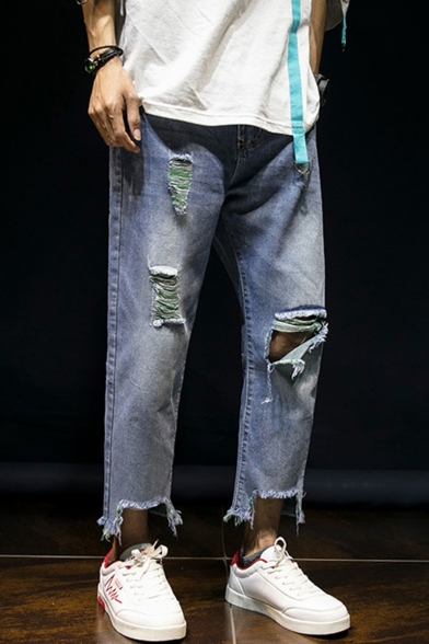 light blue cut jeans