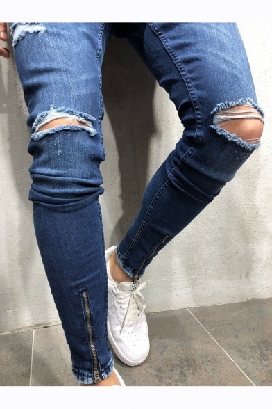 damage blue jeans
