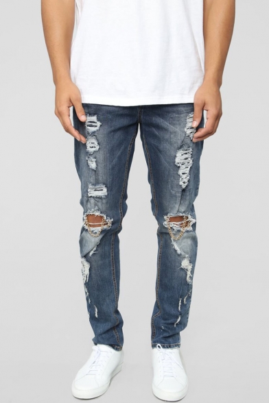 ripped jeans with chains on them