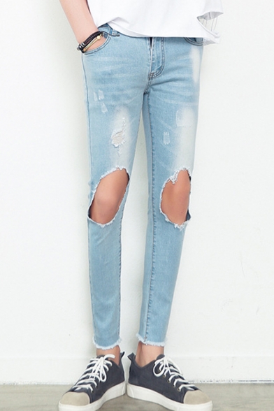 light blue jeans with holes