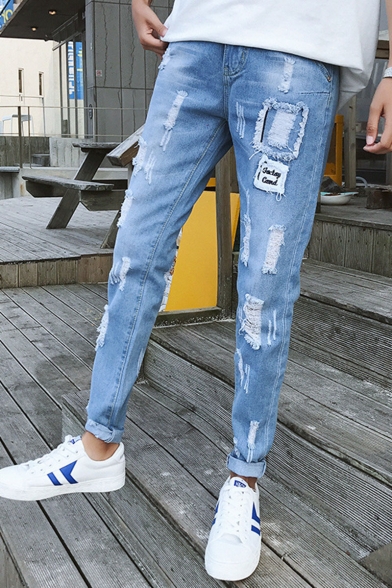 guys letter patched ripped jeans