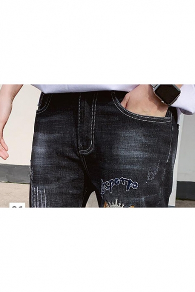 guys letter & cartoon patched ripped jeans