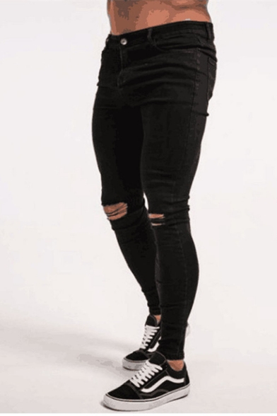 black skinny jeans cut knees