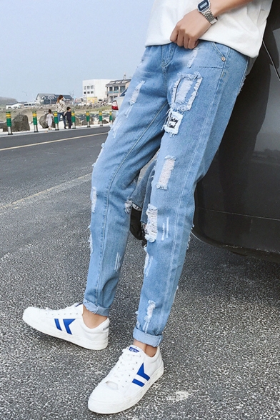 guys letter patched ripped jeans
