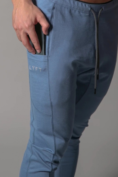 LYFT Letter Print Drawstring Waist Invisible Zipper Pocket Skinny Fit Solid Color Sport Pants