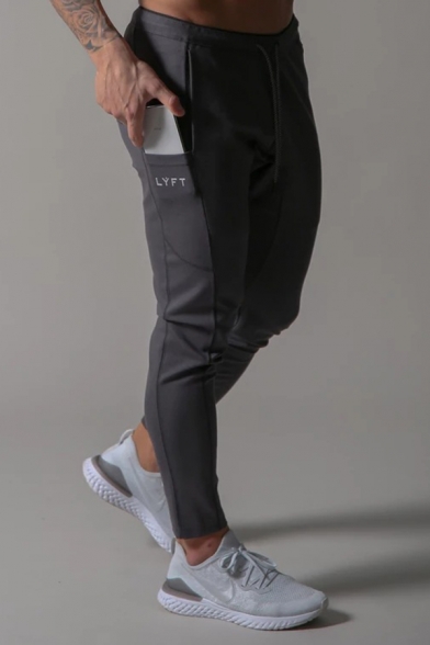 LYFT Letter Print Drawstring Waist Invisible Zipper Pocket Skinny Fit Solid Color Sport Pants