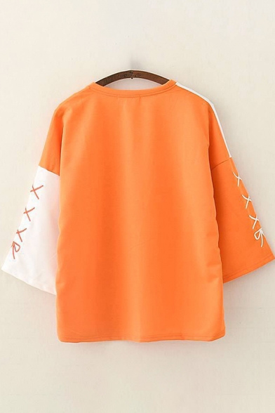 Pretty Womens Three Quarter Sleeve Round Neck Orange Japanese Letter Graphic Color Block Relaxed Fit T-Shirt in Orange