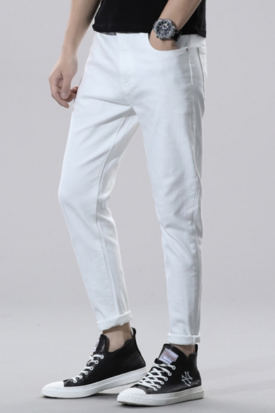 mens white tapered jeans