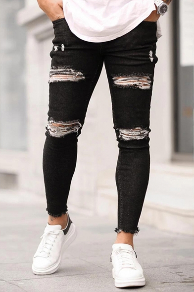 black frayed bottom skinny jeans