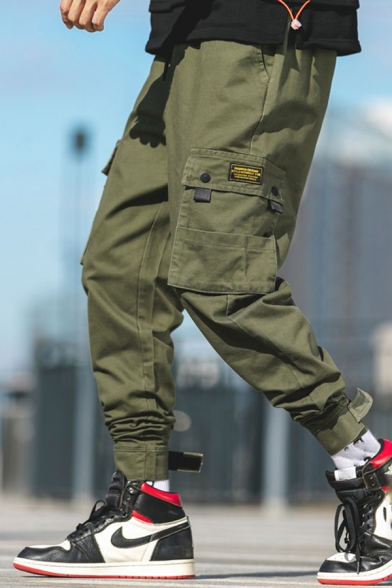 Elegant Men's Cargo Pants Label Detail Flap Pockets Ankle Tied Brushed Drawstring Waist Ankle Length Tapered Pants