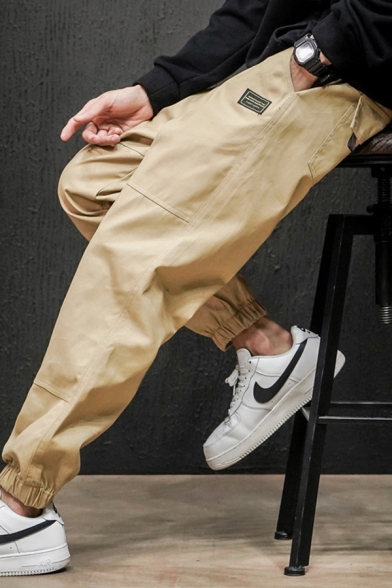 Fashionable Men's Pants Label Patched Side Pockets Drawstring Waist Banded Cuffs Ankle Length Tapered Pants