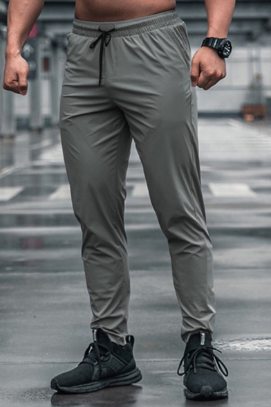 Men Sporty Pants Solid Color Elastic Waist Mid-Rise Front Pocket Full Length Regular Pants