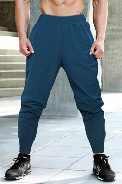 Sportive Men's Pants Pure Color Drawcord Waist Loose Fitted Front Pocket Long Length Pants