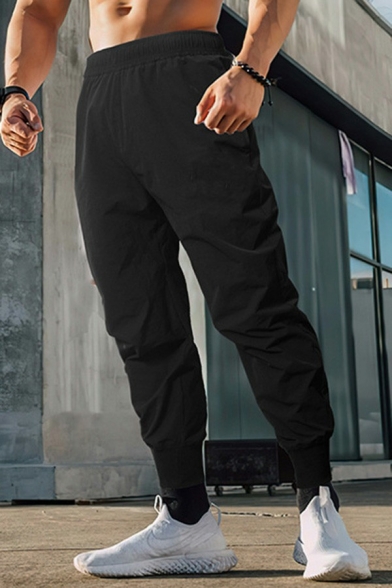 Sportive Men's Pants Pure Color Drawcord Waist Loose Fitted Front Pocket Long Length Pants