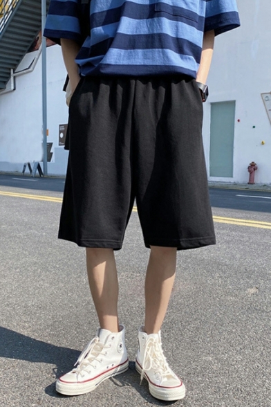 Popular Guys Whole Colored Elastic Waist Pocket Detail Loose Shorts for Guys