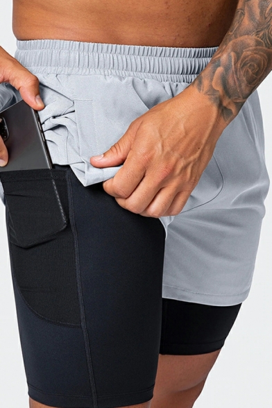 Elegant Men's Contrast Color Side Pocket Elastic Waist Slimming Mid Rise Shorts