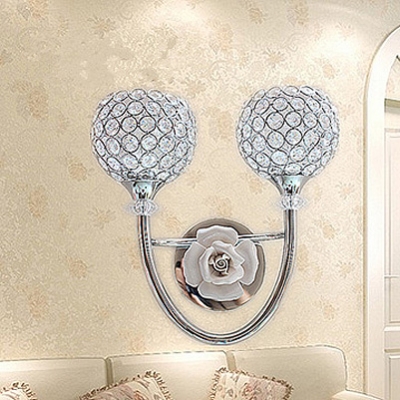 Striking Contemporary Style Wall Sconce Features Globe Design and Graceful Scrolls