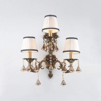 Sophisticates Three Light Wall Sconce Features Wrought Iron Scrolling Arms And Crystal Drops