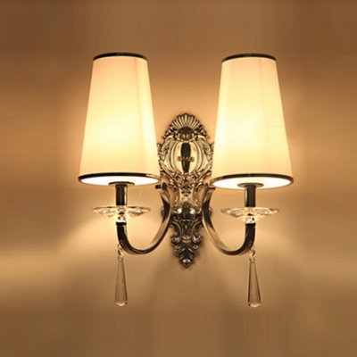 Decorative Crystal Bobeche and Graceful Scrolls Add Glamour to Two Light Wall Sconce