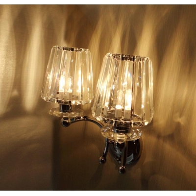 

Graceful Scrolls and Crystal Bobeche Add Glamour to Delightful Two-light Wall Sconce