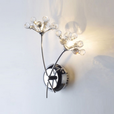 Two Light Reflects Among the Crystal Accents and Chrome Finish of  Gleaming Wall Sconce