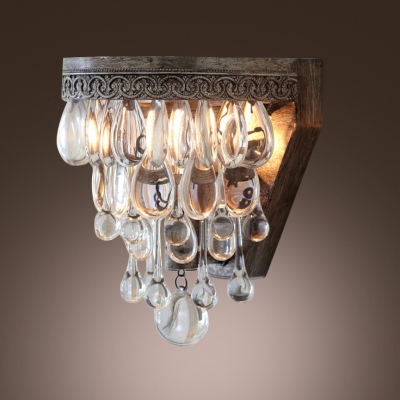 Single Light Wall Sconce Features Beautiful Crystal Teardrops and Delicate Back Plate