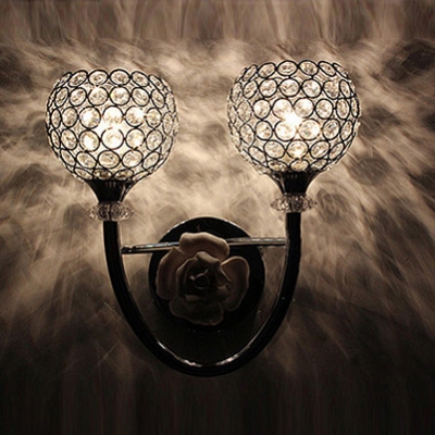 Striking Contemporary Style Wall Sconce Features Globe Design and Graceful Scrolls