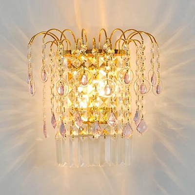 Decadent Wall Sconce Features Gold Finish and Strand of  Crystal Beads