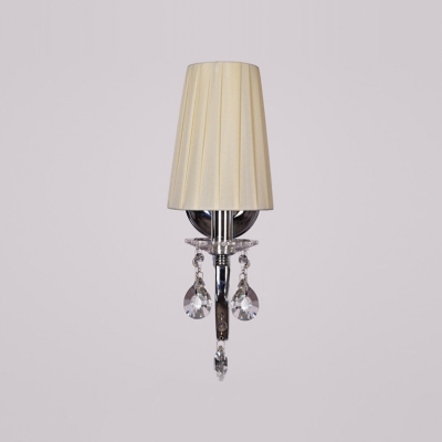 Gleaming Chrome Finish and Crystal Accent Add Glamour to Stunning Single Light Wall Sconce Topped with Beige Fabric Shade