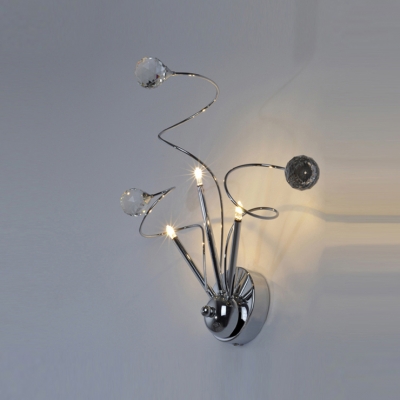 Decorative Wall Sconce Featuring Dramatic Accents of  Sleek Scrolls and Clear Crystal