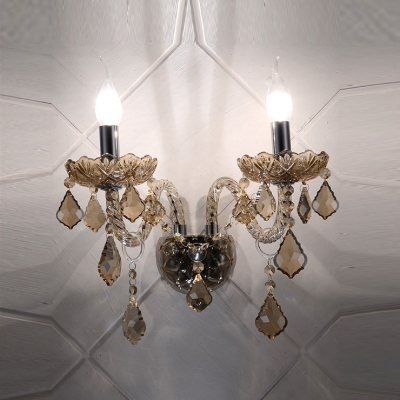 Decorative Scrolling Arms Add Elegance to Glistening Two Light Crystal Wall Sconce
