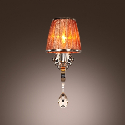 Attractive Chrome Finish and Hand-cut Teardrop Crystal Add Charm to Graceful Single Light  Wall Sconce