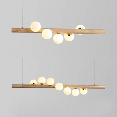Nordic Linear Island Pendant with Globe Shade 5/7 Lights Wood Glass Island Light in Beige for Kitchen