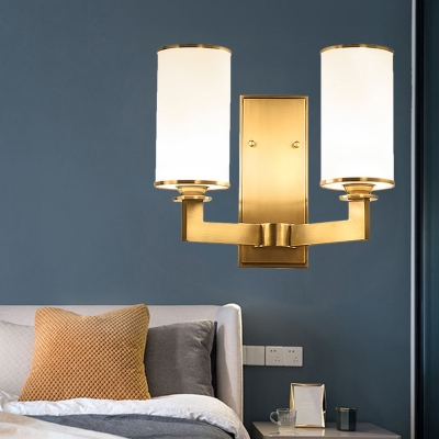 Modernism Cylindrical Wall Mount Light 1/2-Light Frosted White Glass Wall Sconce in Brass for Bedroom