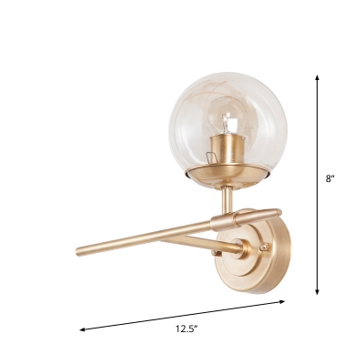 Globe Hand Blown Glass Wall Light Contemporary 1 Light Brass Sconce Light with Crossed Arm