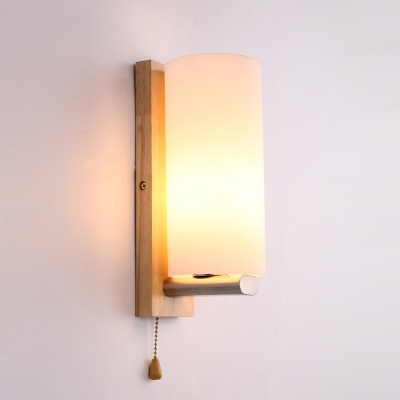 White Glass Cylindrical Sconce Light Modern 1 Bulb Beige Wall Mount Lighting with Rectangle Wood Backplate