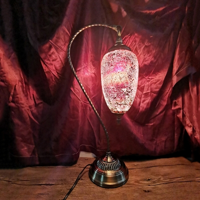 Black Crackle Glass Elliptical Nightstand Lamp Moroccan Single Head Bedroom Table Light in Bronze