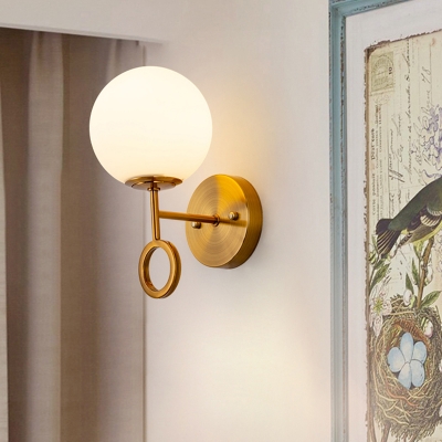 Modernism Ball Wall Sconce Cream Glass 1-Light Bedside Wall Mount Lamp Fixture in Brass