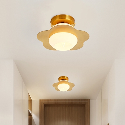 Cream Glass Sphere Flush Light Fixture Modernist 1-Bulb Gold Flush Mount with Flower Metal Panel Detail