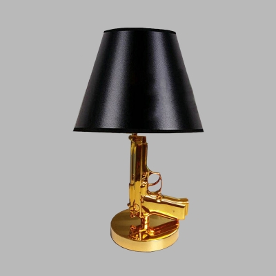 Black Tapered Table Light Modernism 1-Bulb Fabric Nightstand Lamp with Resin Gun-Shaped Design