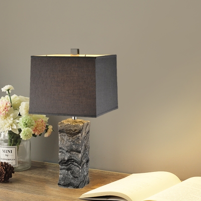 Black Trapezoidal Night Table Lamp Postmodern 1 Bulb Fabric Nightstand Light with Rugged Marble Base