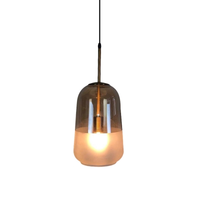Tan and Frosted Glass Capsule Pendant Mid Century Single Hanging Light Fixture over Table