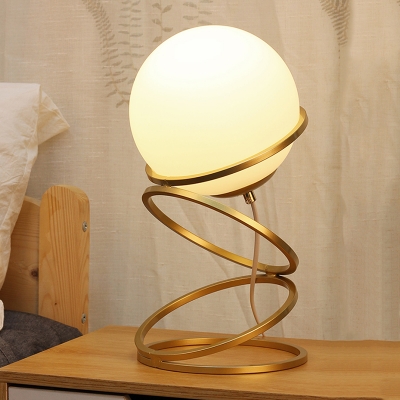 Loop Night Table Light Postmodern Metallic 1-Light Bedside Night Lamp in Gold with Orb Cream Glass Shade