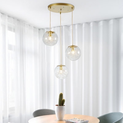 Clear Glass Pumpkin Ball Cluster Pendant Light Minimalist 3 Heads Suspension Lamp in Gold with Metal Line Deco Inside
