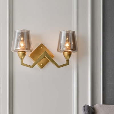 Postmodern Curving Arm Wall Light Metal 2 Heads Living Room Sconce Lighting in Brass with Cone Clear/Smoke Glass Lampshade