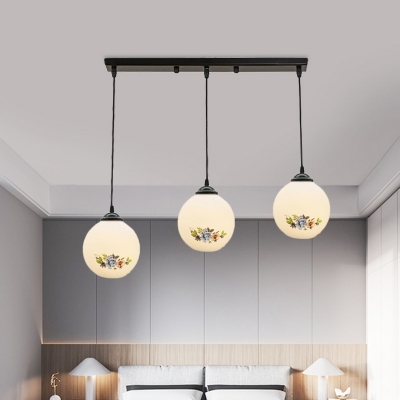 Country Sphere Multi Hanging Light Fixture 3-Light White Glass Pendant Lamp with Flower Pattern, Round/Linear Canopy