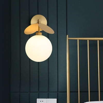 Cream Glass Oval/Globe Wall Sconce Minimalism 1 Head Brass Wall Light Fixture with Leaf Decor